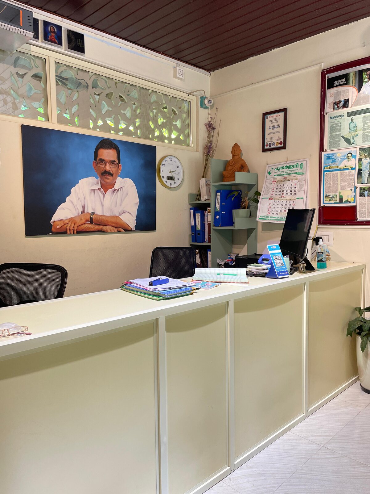 Punarjjany reception, with a portrait of founder Dr. Johns K. Mangalam