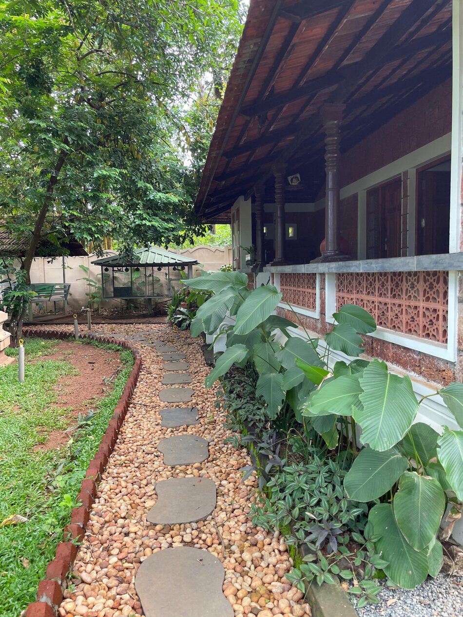 Stepping-stone garden path along the veranda